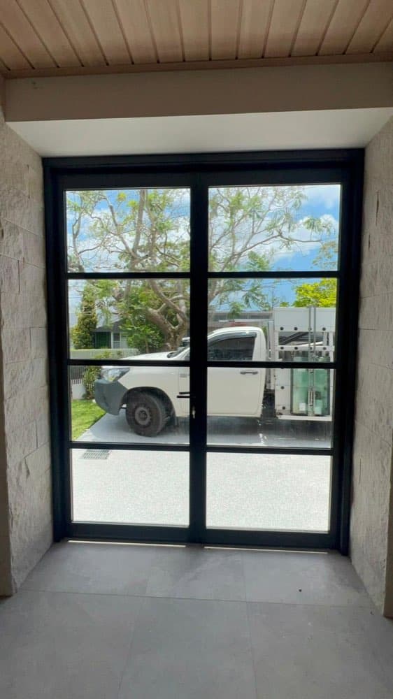 Black Frame Double Doors, Sandstone Facade