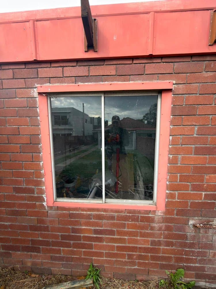 Window Install, Red Brick Industrial Building