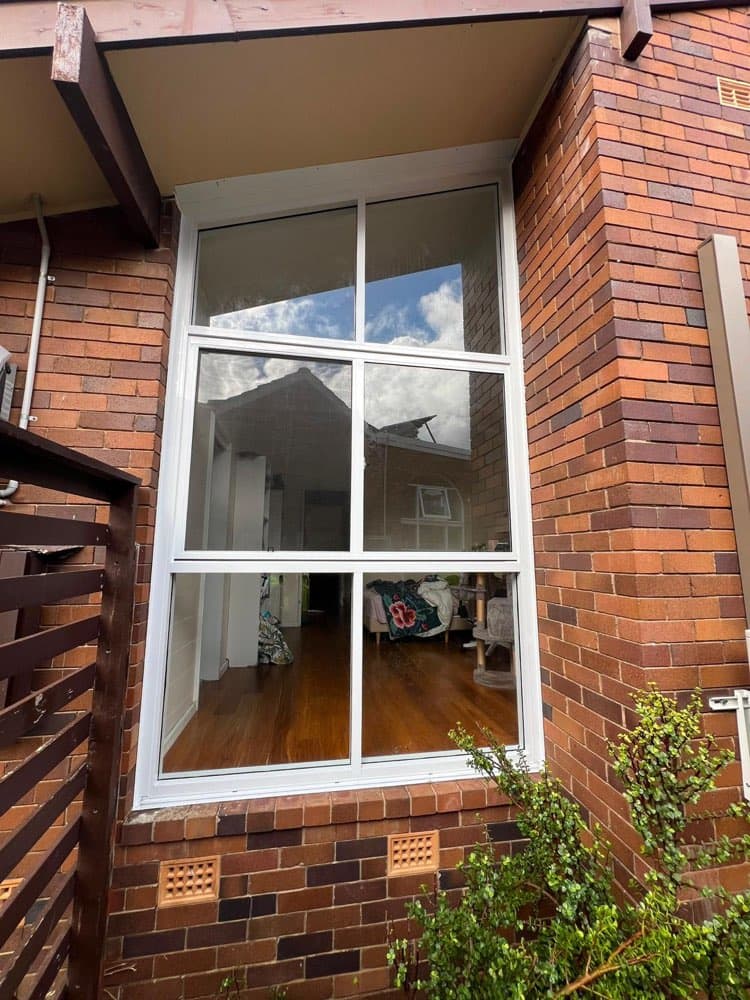 Tall Grid Window, Red Brick Townhouse