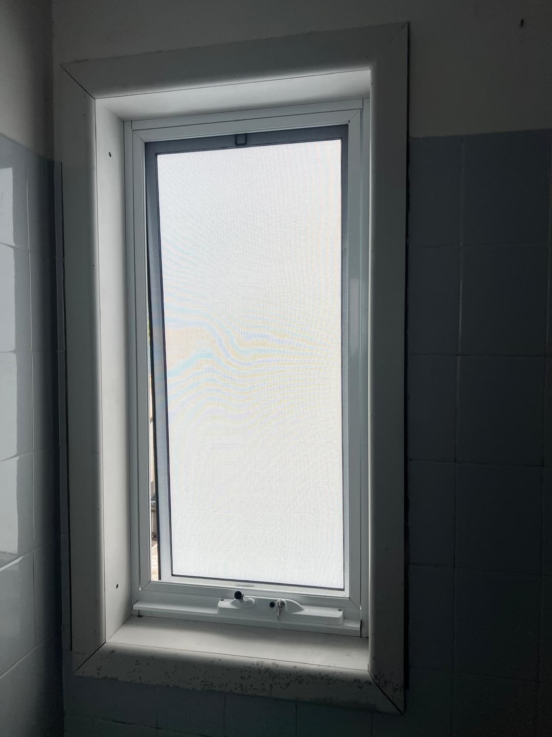 Frosted Awning Window, Unfinished Bathroom