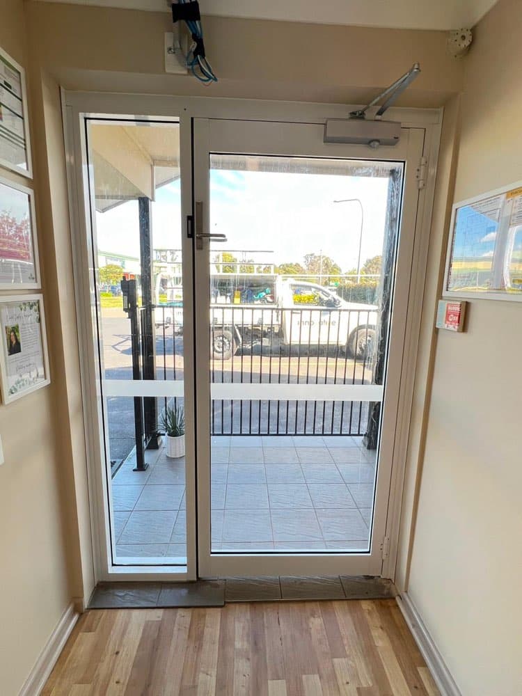 White Frame Entry Door with Security Screen, Tiled Foyer